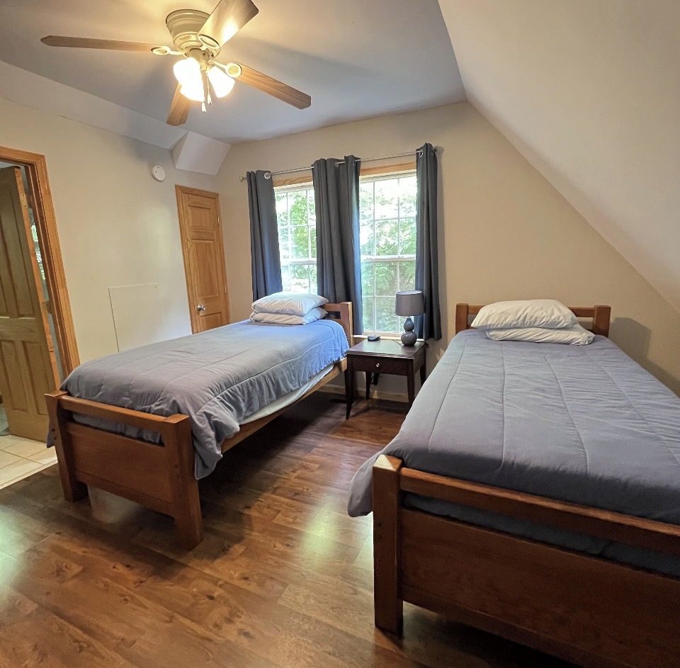 Loft bedroom with two twin beds